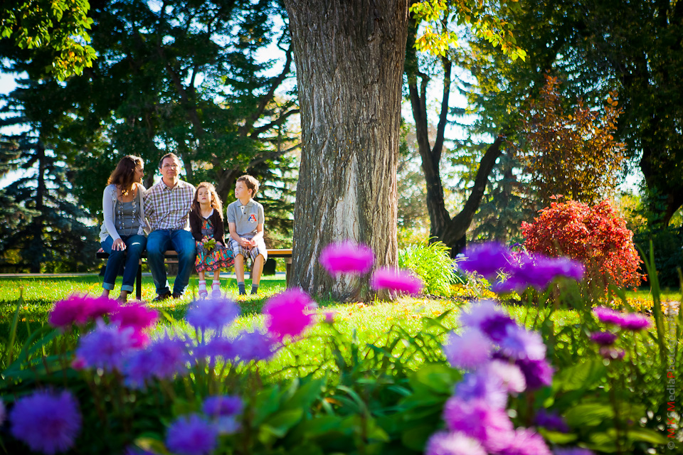 family photography with flowers in front
